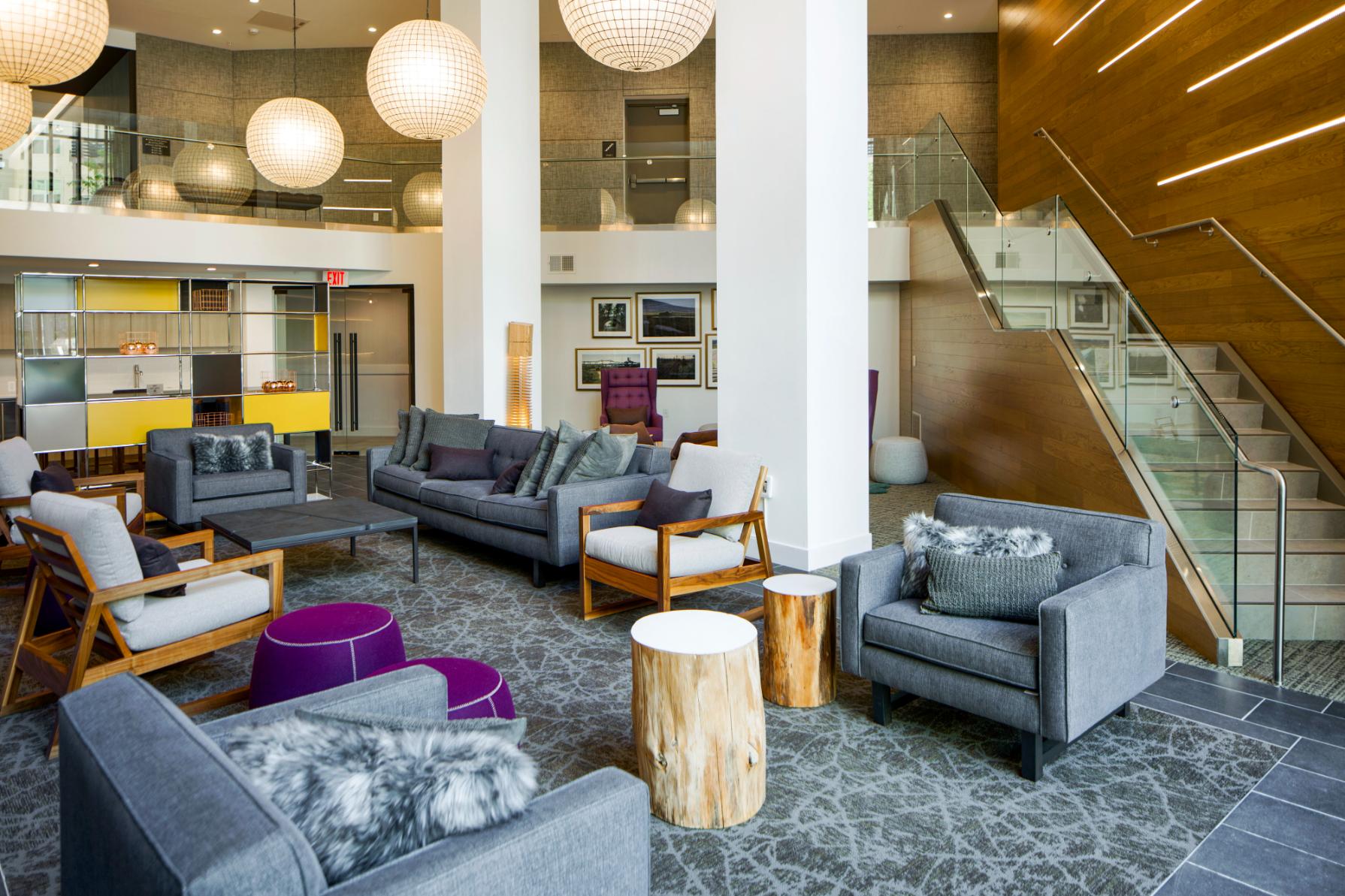 Lobby with fireplace in front of comfortable seating