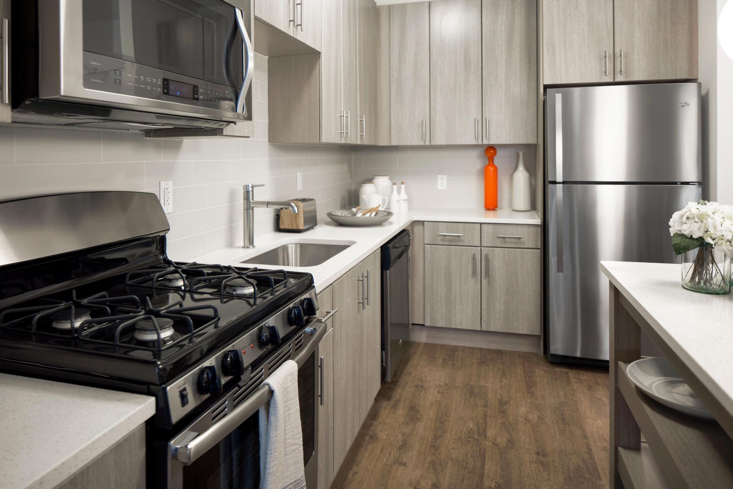 Side view of the kitchen island and fridge