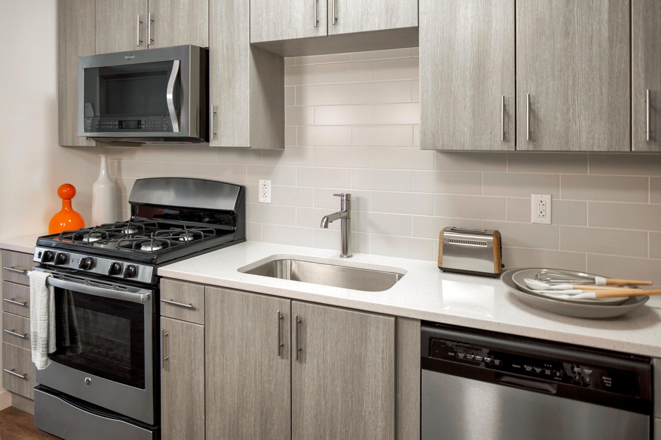 Close-up of modern kitchen appliances.