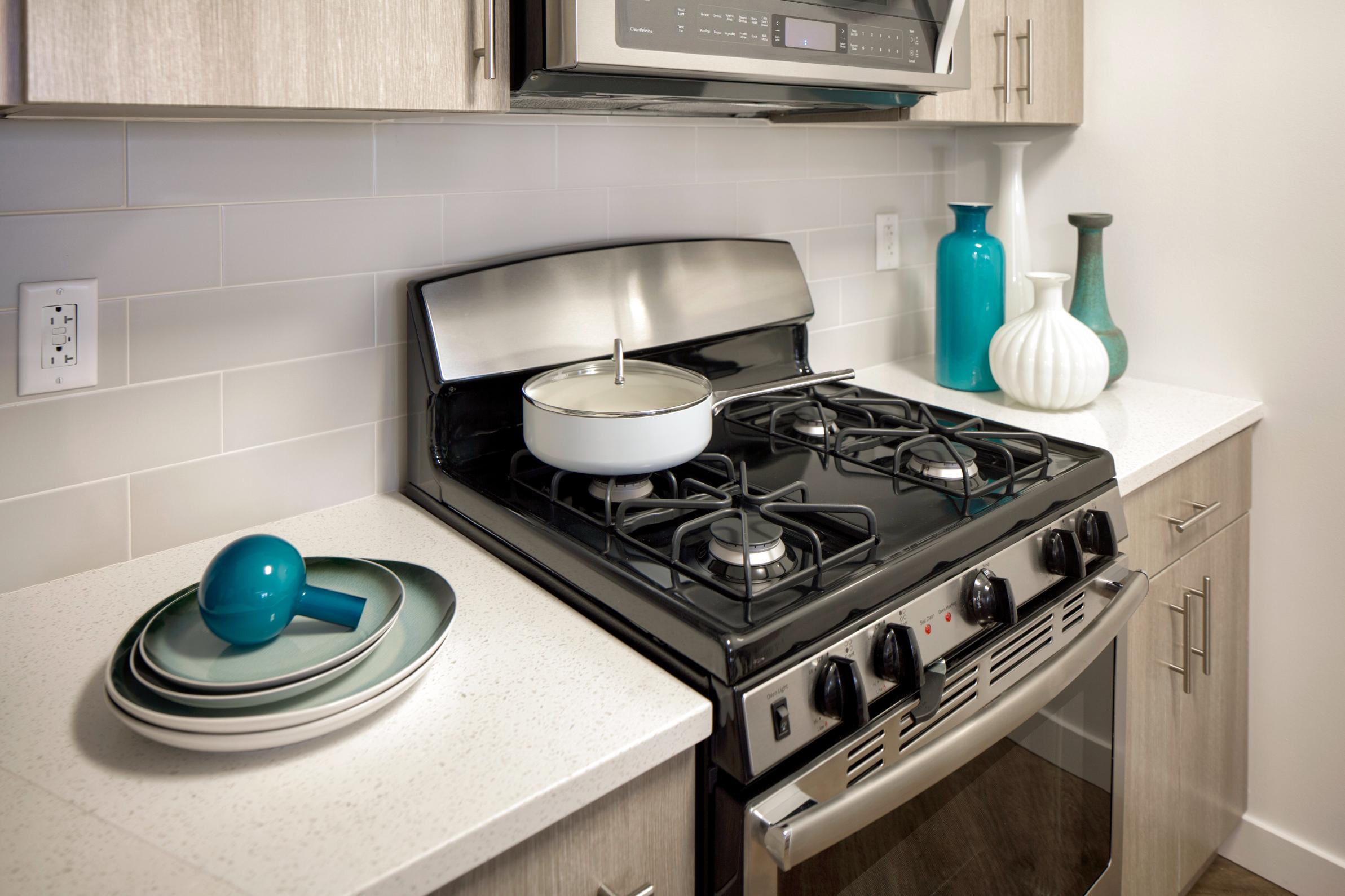 Kitchen with modern appliances, countertop space, and cabinets